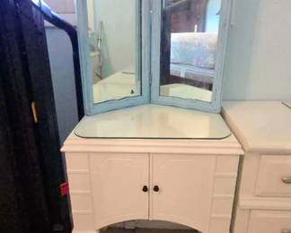 Vintage sewing machine cabinet painted white