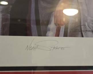 Singed by Noah Stokes