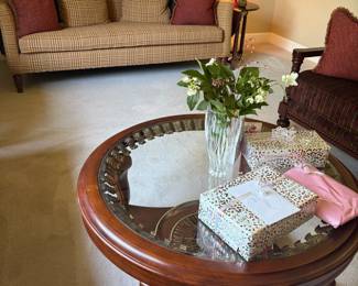 Round coffee table, couch, pillows