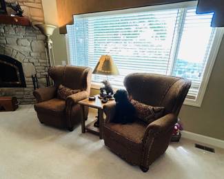 Large arm chairs, side table, lamps