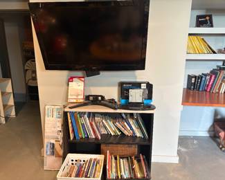 TV and stands, books, albums 