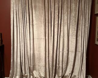 a dozen ivory and silver velvet drapes