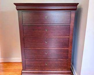 Tall dresser with pair of matching side tables.  Hidden drawer in top of each piece.