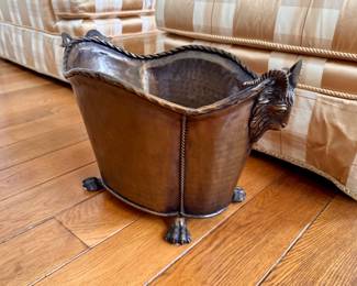 Metal container with paw feet and Rams heads