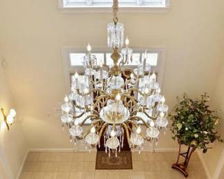 Large gold and crystal chandelier in foyer