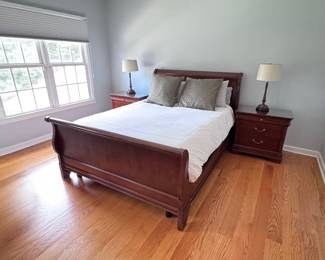 Bedroom suite by Drexel - sleighbed (mattress not included), pair of side tables, and long dresser