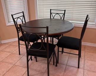 Round Table with Four Chairs