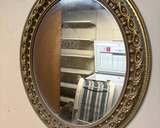 Ornate Oval Giltwood Mirror