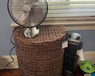 Fans and wicker hamper, baby toys