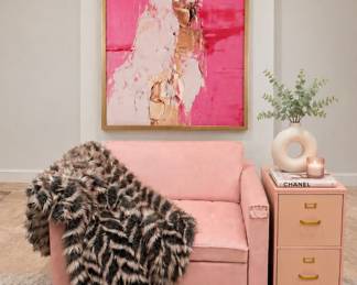 Pink cuddler recliner, filing cabinet, artwork & accent blanket