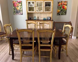 66x42 Amish made table with 2 12” leafs hidden in table. Extends to 90”
