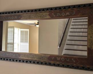 Chinoiserie-style accent mirror.  73” x 34” 3” deep  Ornate & painted wooden frame with intricate Asian floral motifs, geometric border detailing & multi-layered design. 