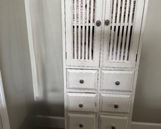 Distressed Cabinet. 20.5” wide, 14” Deep, 59” Tall  8 drawers & 2 storage area behind the doors