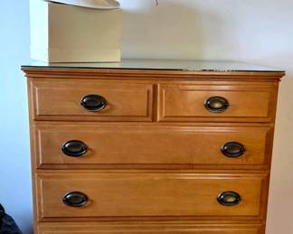 This is one of (2) matching tall maple wood dressers made by Statton