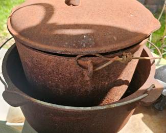 Cast iron, needs cleaning and seasoning