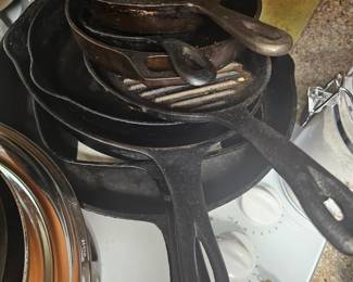 lots of cast iron pans