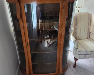 #6	West End Furniture Co. Oak and Rounded Glass w/4 wood shelves (not lighted) - 43x17x61 FIRM	 $175.00 