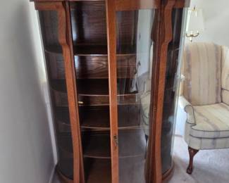 #6	West End Furniture Co. Oak and Rounded Glass w/4 wood shelves (not lighted) - 43x17x61 FIRM	 $175.00 