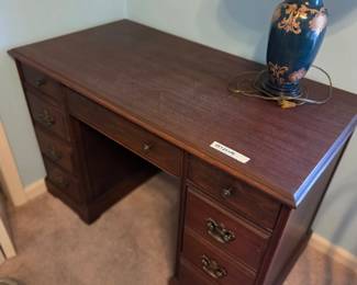#33	Wood Desk w/8 Drawers (missing one pull but inside the drawer, one drawer missing stoppers) - 44x23x29	 $50.00 