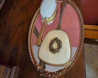 #52	Gold Framed Oval Mirror w/Gold Brush, Comb and Mirror - 17"L	 $25.00 