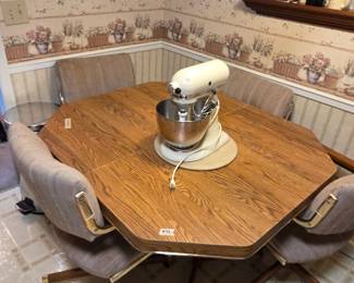 #72	Kitchen Table w/4 chairs on Wheels w/Laminate Wood and Laminate Table Top - 42x48x29	 $60.00 