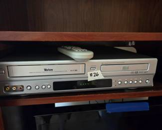 #26	Tevion VHS/DVD Player- Model 3215 w/remote	 $30.00 