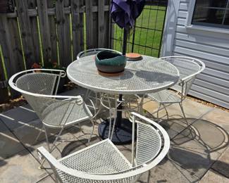#129	White Metal Round Table w/4 chairs - 42x30 w/umbrella and Base	 $175.00 