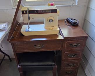 #82	Sewing Cabinet w/Singer 1425 Sewing Machine in Cabinet - Cabinet has 4 drawers w/drop-in Bobbin and Stool - Cabinet measures 32-54 x20x31	 $45.00 