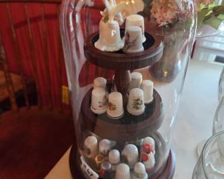 #67	Collection of Thimbles in Glass Dome w/Wood Base - 12" Tall	 $45.00 
