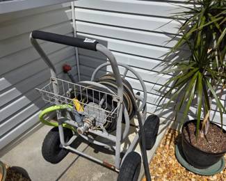 #135	Hose Reel onWheels w/approx 50 feet of hose w/Rubber tires	 $30.00 
