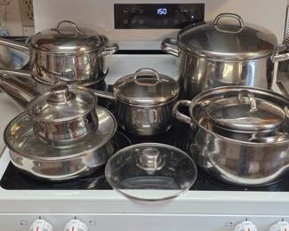 Multiple sets of stainless cookware