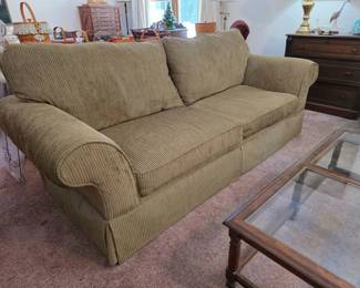 Corduroy fabric Realistic brand sofa by Klaussner, matching club chair also in auction