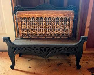Antique cast iron gas heating stove, heater