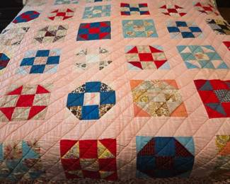 Hand-stitched quilt