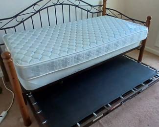 3rd matching piece to trundle bedroom set. The bottom rolls out and extends up to sleep on