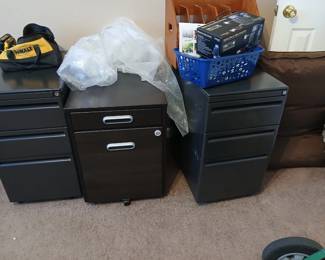 3 of 4 filing cabinets
