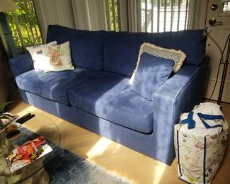 Suede-like navy blue sofa seats 3