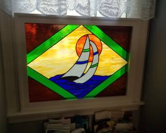 Stained glass window insert with frame