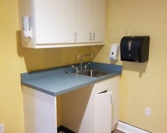 Upper cabinets; base cabinet with sink