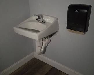 Sink; paper towel dispenser