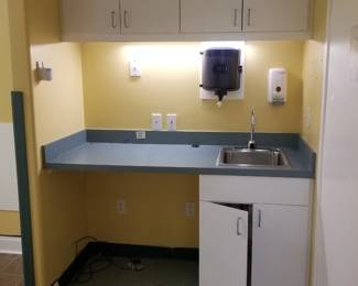 Upper cabinets; base cabinet with sink