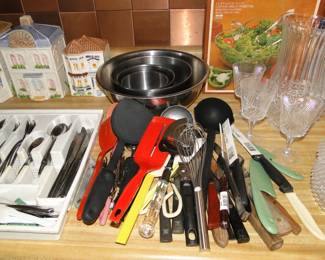 Kitchen utensils and some stainless steel mixing bowls