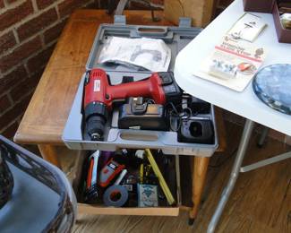 That Mid Century Modern table is in need of some TLC, but it does have those classic lines