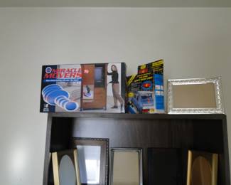 Miracle Movers, and a rear vehicle light, and some picture frames