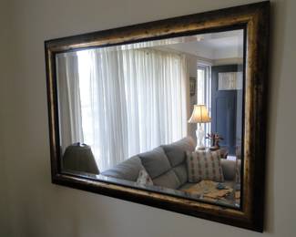 Framed mirror, with beveled edging