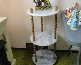 Heavy marble table, the three tiered variety