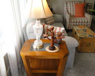 We have a pair of these end tables, with glass inlay, and two storage shelves