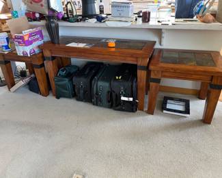 End tables and suitcases