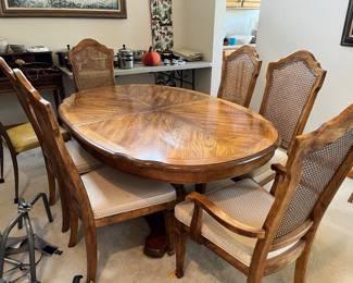Dining table and 6 chairs, also inclues a leaf for the table.
