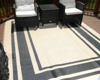 Outdoor rug and chairs